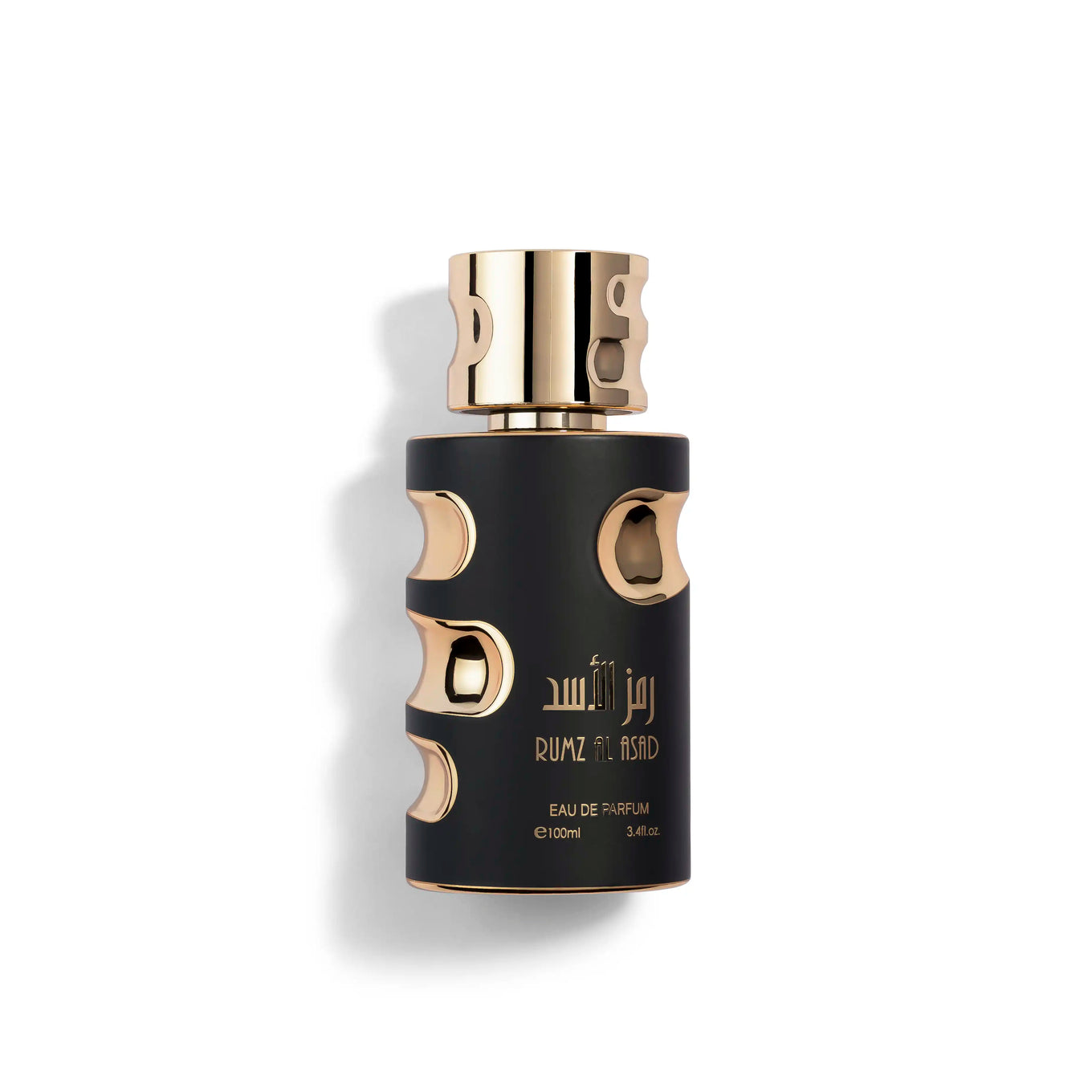 Black and gold perfume bottle with 'Rumz Al Asad' branding on a white background and a product of shaikh saeed perfumes
